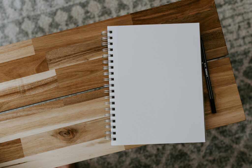 nobook sitting on a wooden table