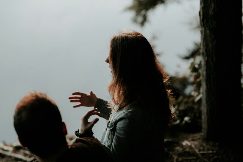 From above a woman talking expressively with her hands